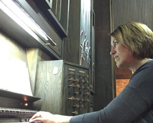Julia playing organ at American Reformed Church; photo by Lyle Huisman